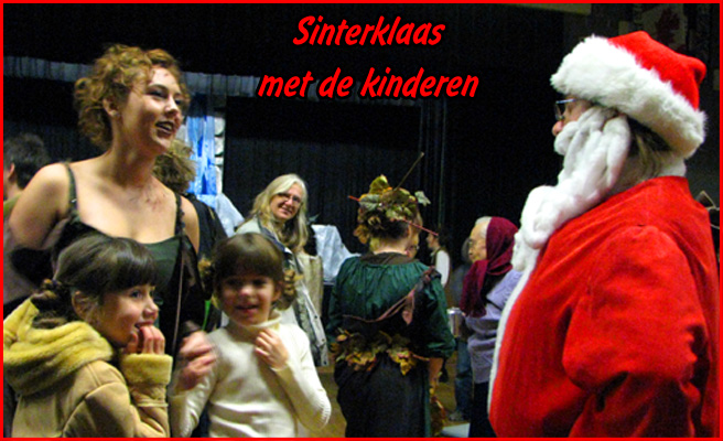 after the show, Father Christmas mingles with the young members of the audience