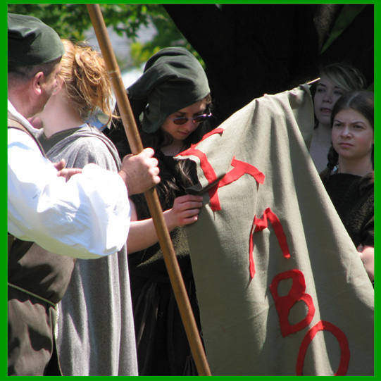 Crispin checks his banner